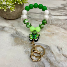 Load image into Gallery viewer, Silicone Bracelet Keychain - Olive Green Butterfly
