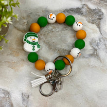 Load image into Gallery viewer, Silicone Bracelet Keychain - Christmas Winter - Green Orange Snowman
