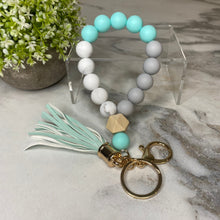 Load image into Gallery viewer, Silicone Bracelet Keychain with Wood Bead &amp; Tassel - Aqua
