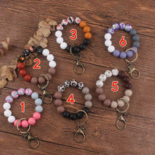 Load image into Gallery viewer, Silicone Bracelet Keychain - Floral/Solids - PREORDER 5/6-5/9
