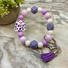 Load image into Gallery viewer, Silicone Bracelet Keychain with Tassel - Cow - Purple
