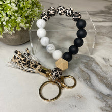 Load image into Gallery viewer, Silicone Bracelet Keychain with Wood Bead &amp; Tassel - Animal Print
