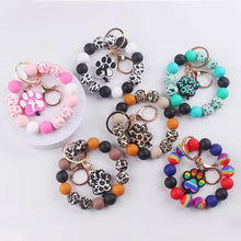 Load image into Gallery viewer, Silicone Bracelet Keychain - Paw Print #2 - PREORDER 5/6-5/9
