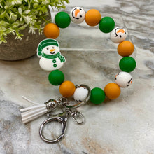 Load image into Gallery viewer, Silicone Bracelet Keychain - Christmas Winter - Green Orange Snowman
