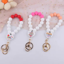 Load image into Gallery viewer, Silicone Bracelet Keychain - Teacher &amp; Nursing - PREORDER 5/6-5/9
