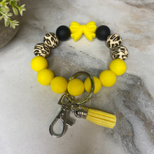 Load image into Gallery viewer, Silicone Bracelet Keychain - Yellow Bow
