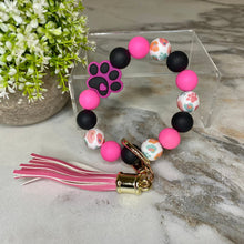 Load image into Gallery viewer, Silicone Bracelet Keychain - Paw Print Hot Pink
