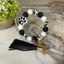 Load image into Gallery viewer, Silicone Bracelet Keychain - Paw Print Black
