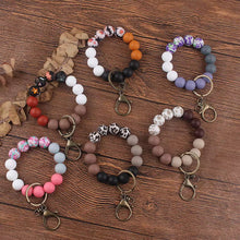 Load image into Gallery viewer, Silicone Bracelet Keychain - Floral/Solids - PREORDER 5/6-5/9
