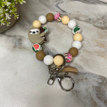 Load image into Gallery viewer, Silicone Bracelet Keychain - Sloth Tan Floral
