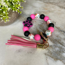 Load image into Gallery viewer, Silicone Bracelet Keychain - Paw Print Hot Pink
