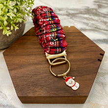 Load image into Gallery viewer, Scrunchie Bracelet Keychain - Red Blue Green Snowman
