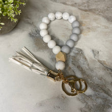 Load image into Gallery viewer, Silicone Bracelet Keychain with Wood Bead &amp; Tassel - White Marble
