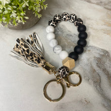 Load image into Gallery viewer, Silicone Bracelet Keychain with Wood Bead &amp; Tassel - Animal Print
