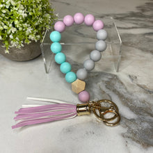 Load image into Gallery viewer, Silicone Bracelet Keychain with Wood Bead &amp; Tassel - Lavender &amp; Aqua
