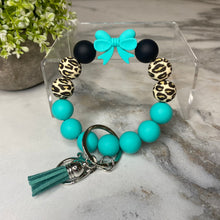 Load image into Gallery viewer, Silicone Bracelet Keychain - Teal Bow
